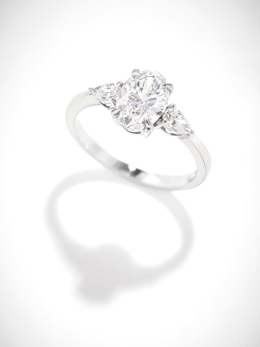 Guillermo- 1.25 CT Oval Three Stone Style Moissanite Ring