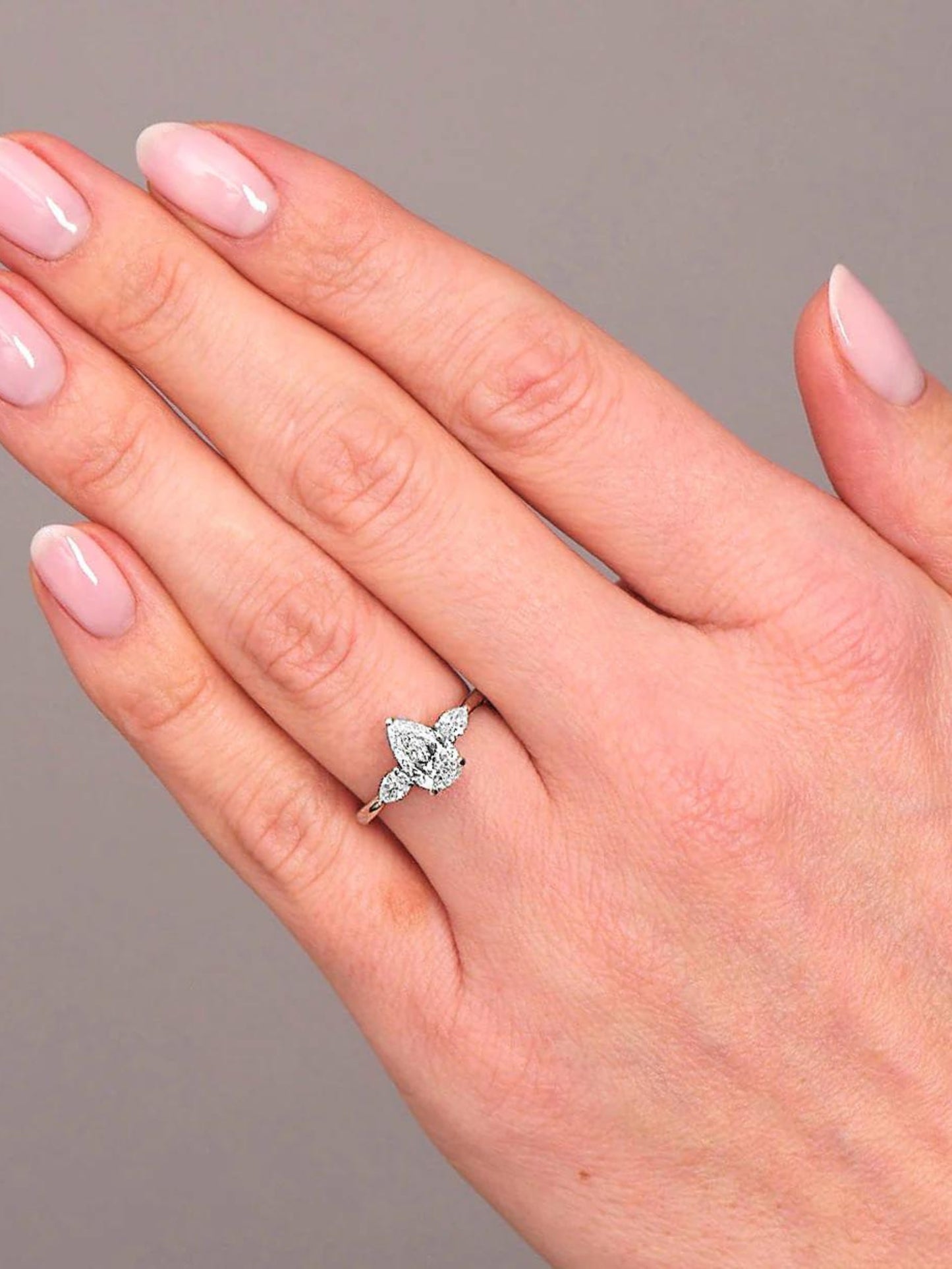 Rhonda- 1.0 CT Pear Three Stone Style Moissanite Ring