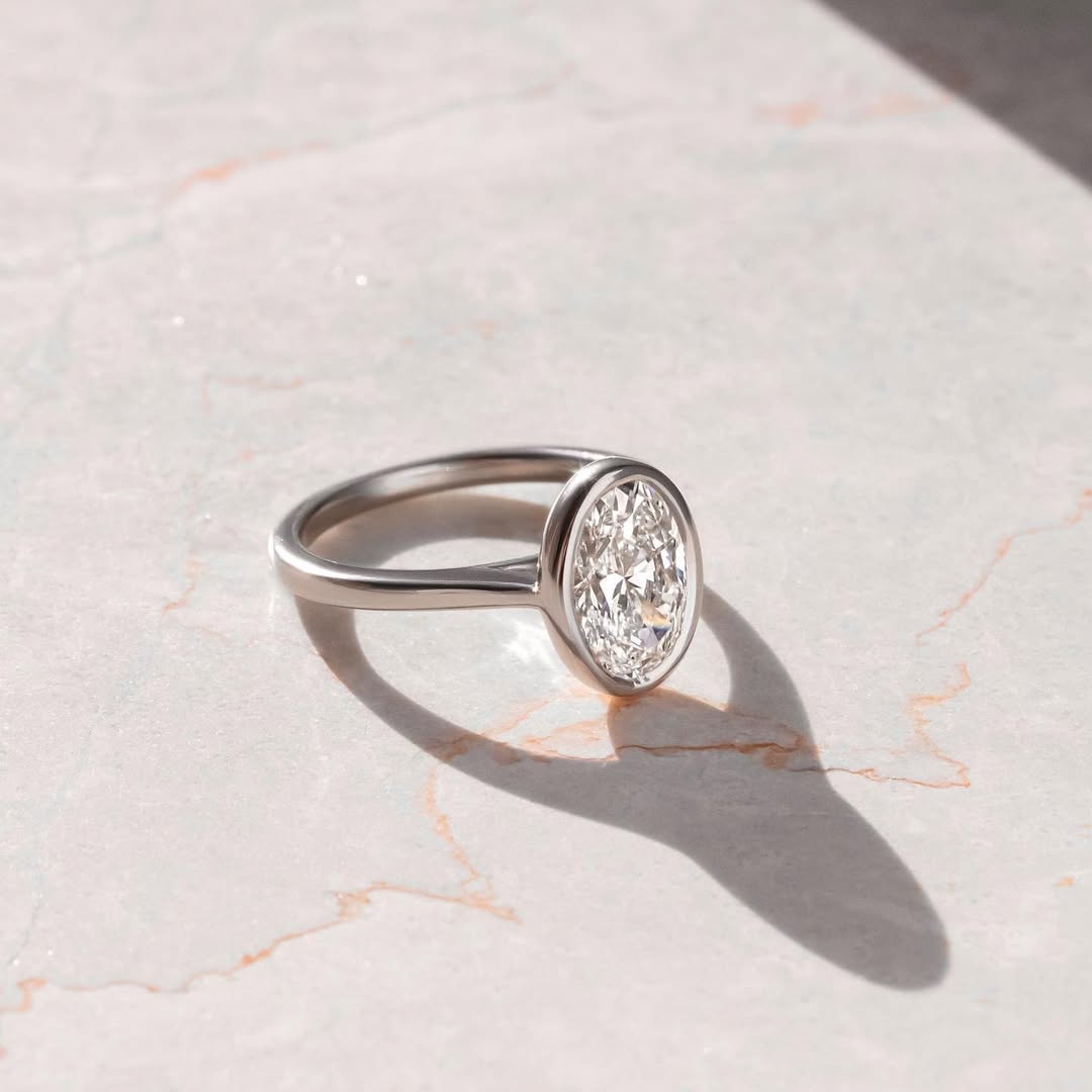 1.50 CT Oval E/VVS2 CVD Diamond Bezel Style Engagement Ring