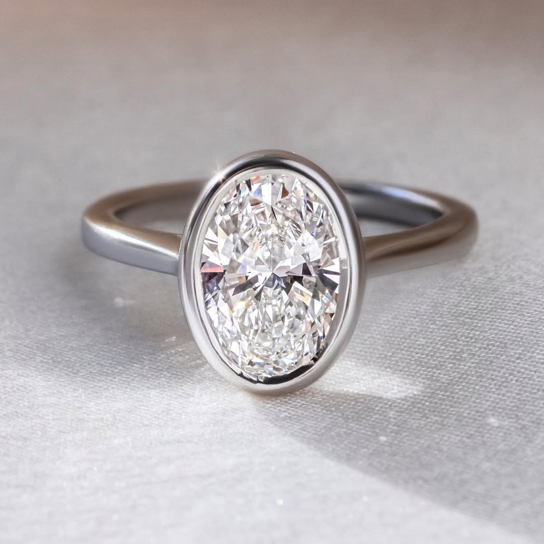 1.50 CT Oval E/VVS2 CVD Diamond Bezel Style Engagement Ring