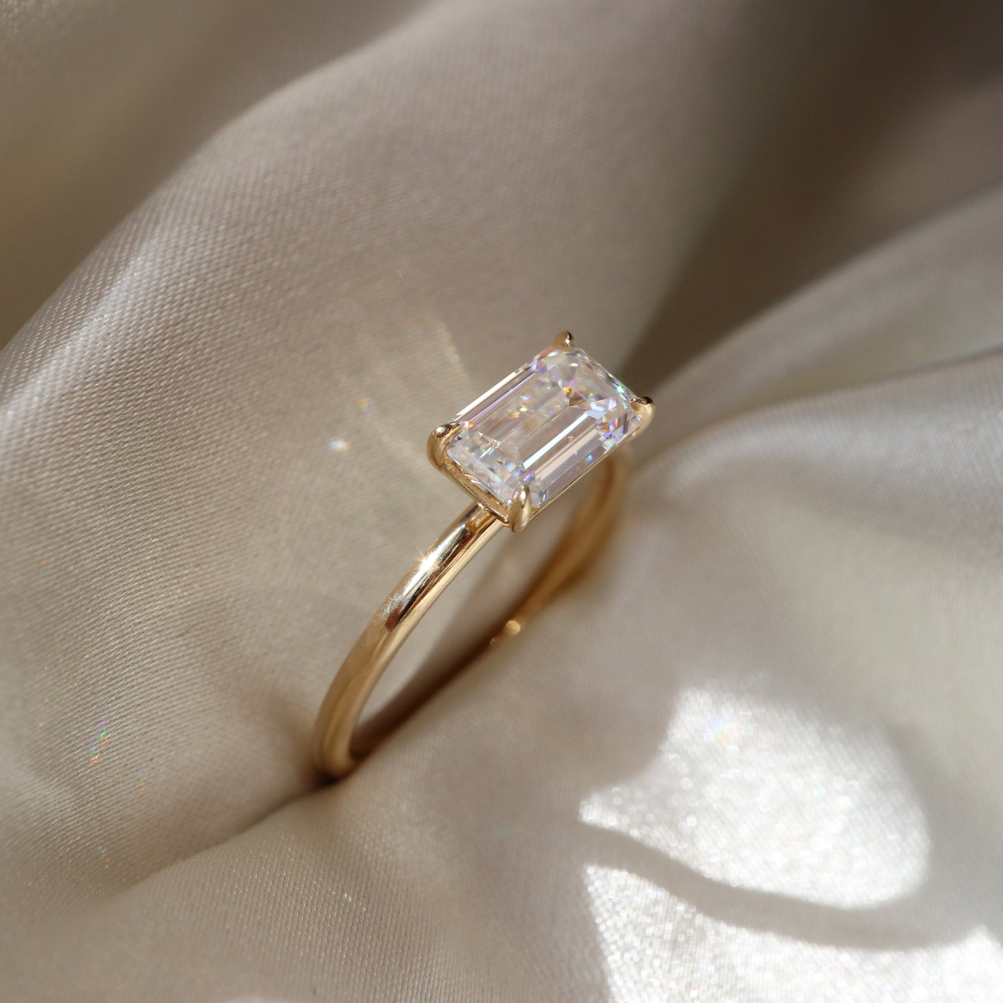 Gladys- 1.0 CT East West Emerald Solitaire Moissanite Ring
