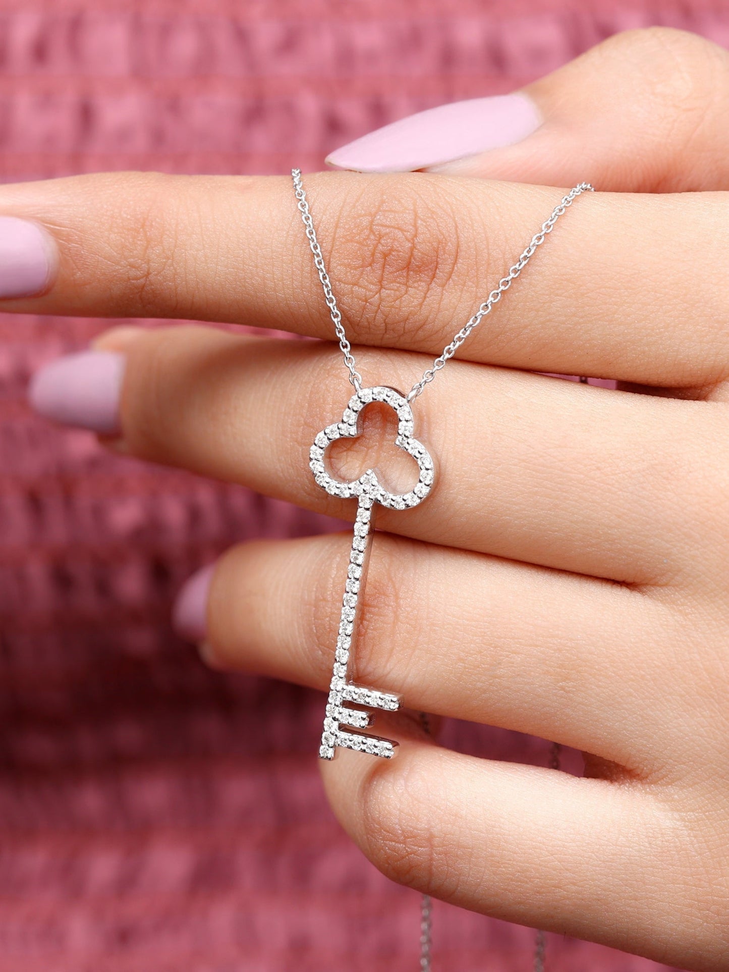 Rose- 0.81 TCW Round Key Moissanite Necklace