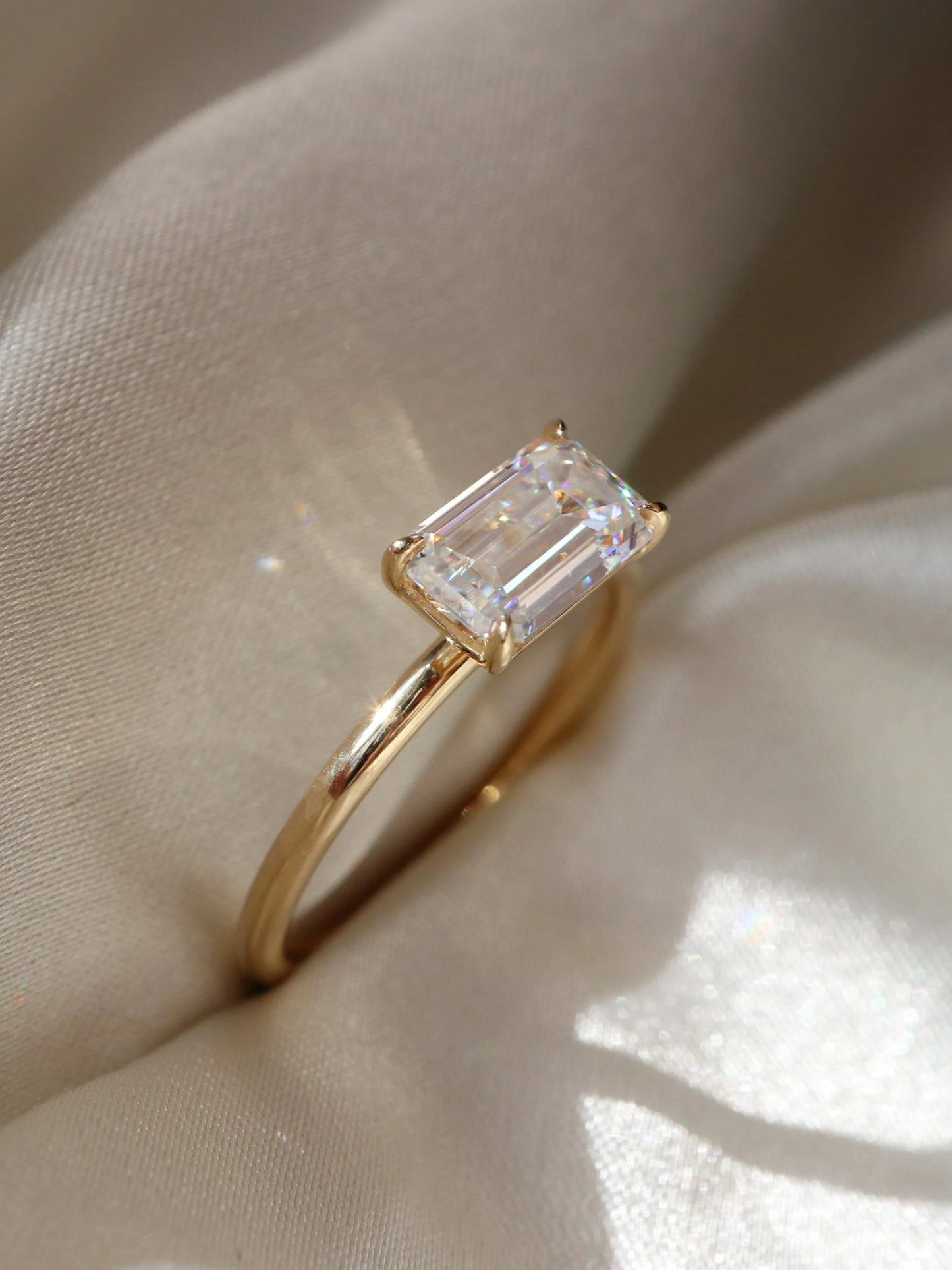 Gladys- 1.0 CT East West Emerald Solitaire Moissanite Ring