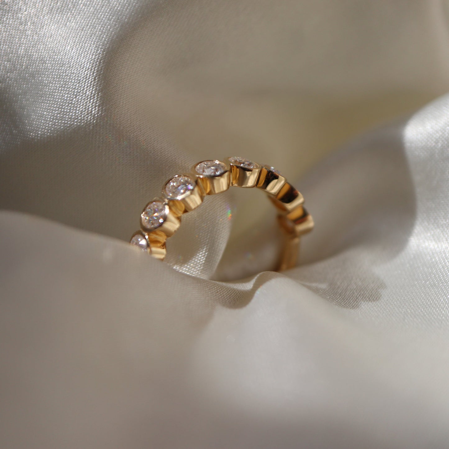 Ramo-0.60 CTW Oval Bezel Wedding Band