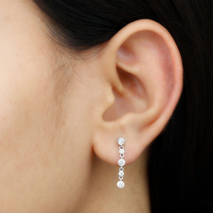 Lydia- 0.67 TCW Round Dangle Bezel Moissanite Earrings