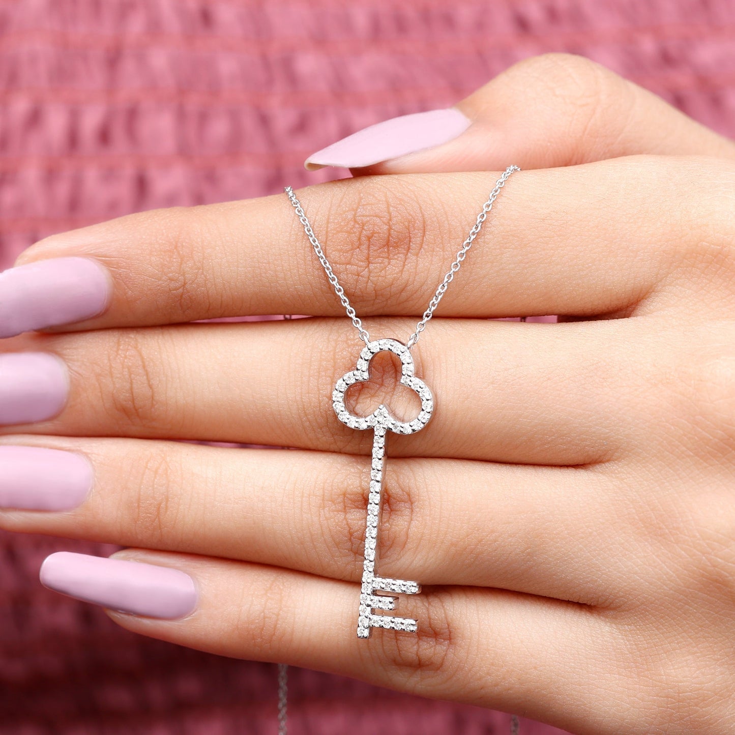 Rose- 0.81 TCW Round Key Moissanite Necklace