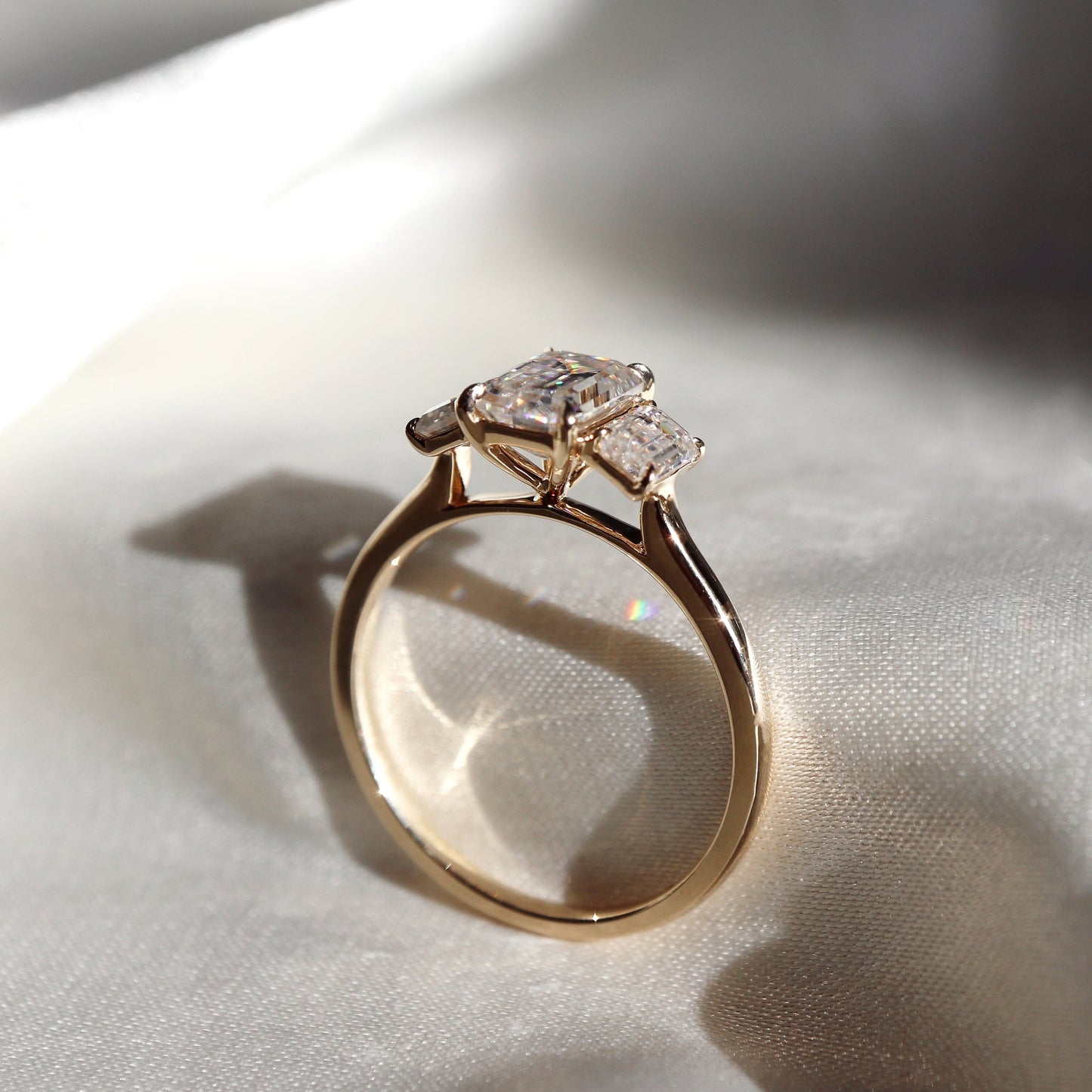 Larry- 1.0 CT Emerald Three Stone Style Moissanite Ring