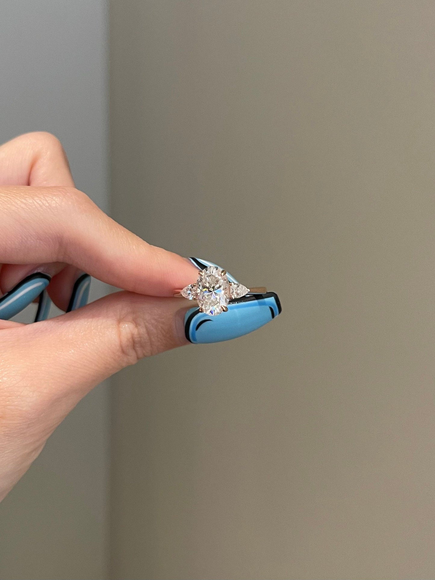Michelle- 2.5 CT Oval Three Stone Style Moissanite Ring