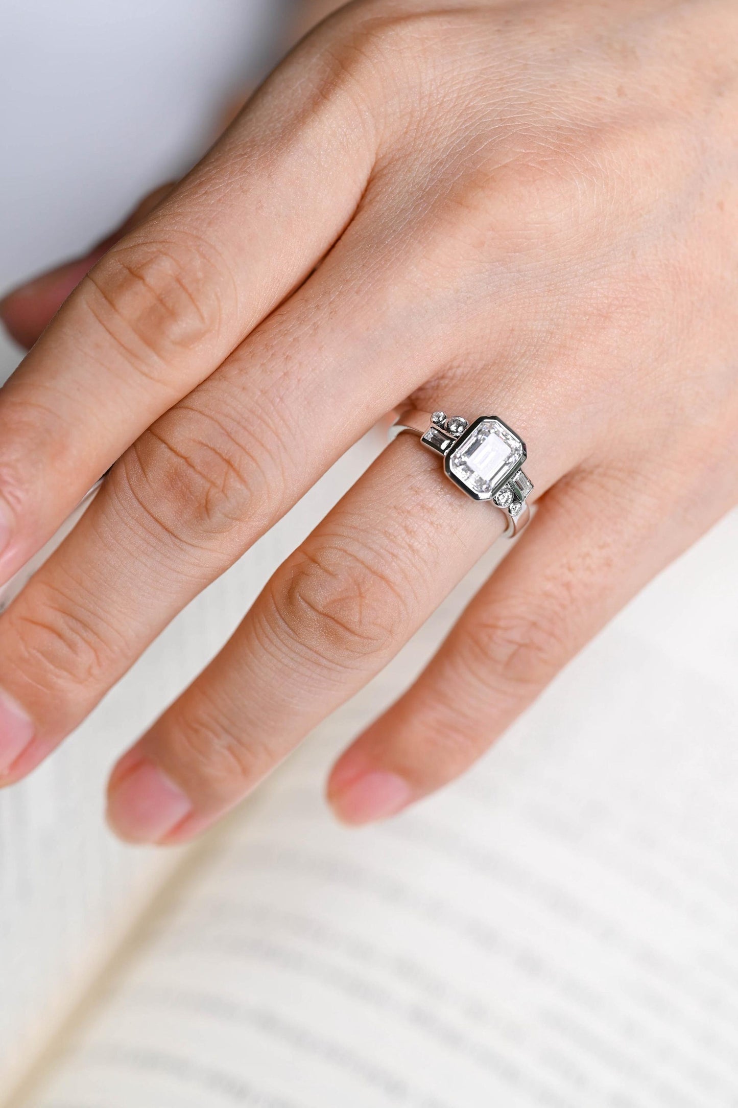 1.0 CT Emerald Cut Bezel & Cluster Moissanite Engagement Ring