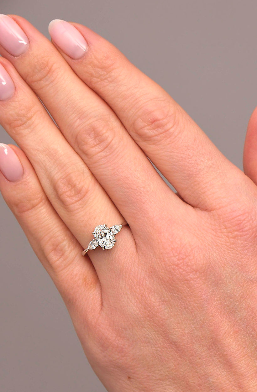 Guillermo- 1.25 CT Oval Three Stone Style Moissanite Ring