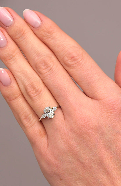 Guillermo- 1.25 CT Oval Three Stone Style Moissanite Ring
