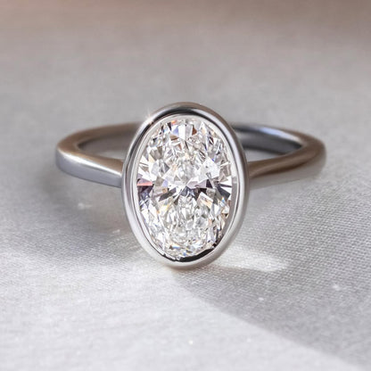 1.50 CT Oval E/VVS2 CVD Diamond Bezel Style Engagement Ring