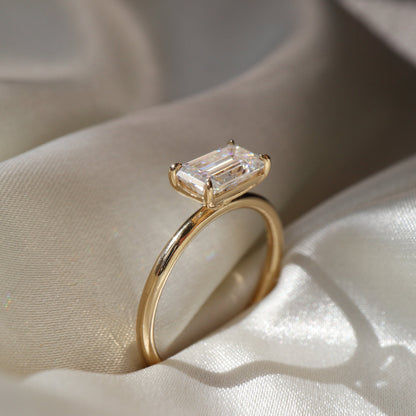 Gladys- 1.0 CT East West Emerald Solitaire Moissanite Ring