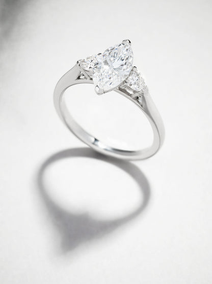 April- 1.30 CT Marquise Three Stone Style Moissanite Ring