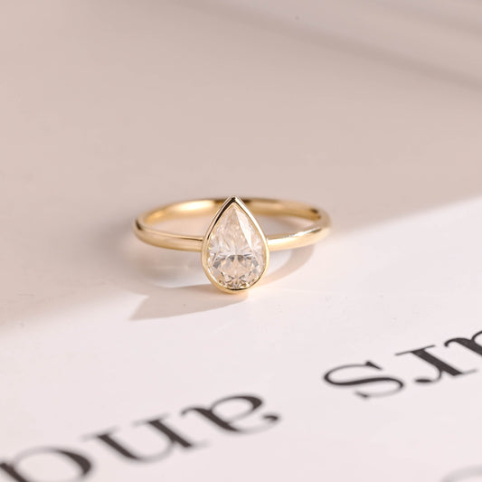 0.80 CT Pear Cut Bezel Moissanite Engagement Ring
